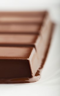 Melting bar of chocolate