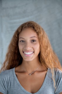Portrait of smiling Mixed Race woman