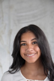 Portrait of smiling Hispanic girl