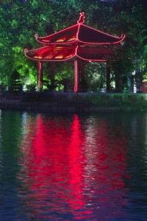 Colorful Vietnamese pagoda near water
