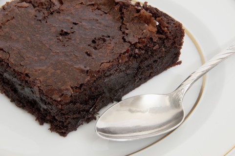 Close up of chocolate brownie and spoon