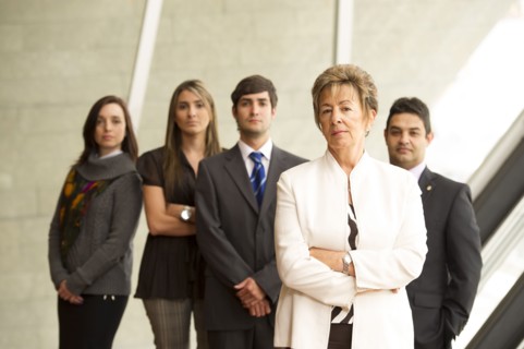 Hispanic business people standing together