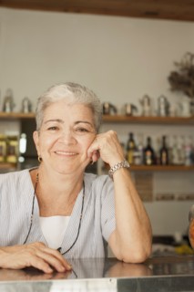 Smiling Hispanic woman in cafe