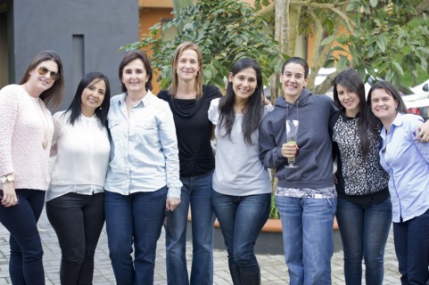 Smiling friends standing outdoors