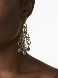 African woman wearing glamorous earrings