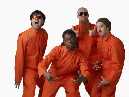 Multi-ethnic criminals in prison uniforms