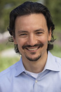 Close up of smiling mixed race man