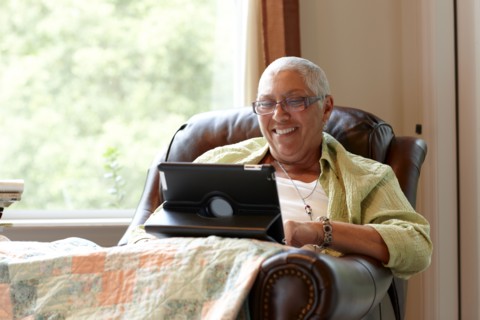 Caucasian woman using digital tablet