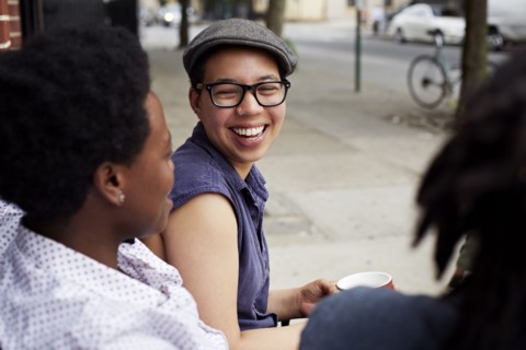 Women talking on city street