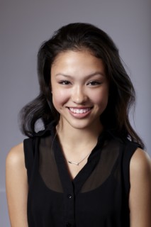 Mixed race teenage girl smiling