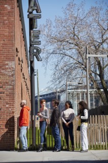 Friends waiting in line at theater