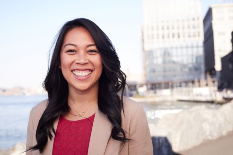 Pacific Islander woman smiling at waterfront