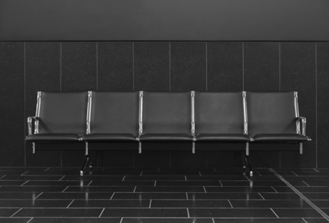 Empty seats in airport lobby