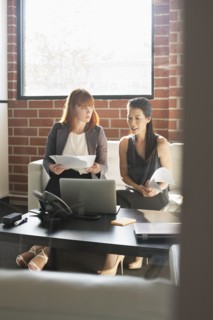 Businesswomen working together in office