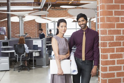 Business people smiling in office