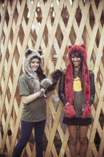Women wearing furry hats outdoors