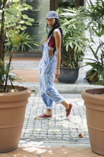 Casual Mixed Race woman walking in street