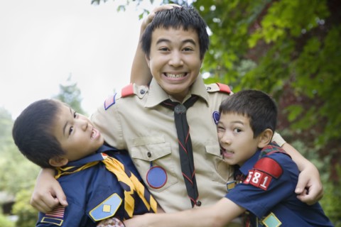 Asian brothers hugging