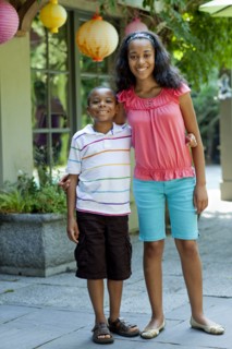 Smiling African American brother and sister