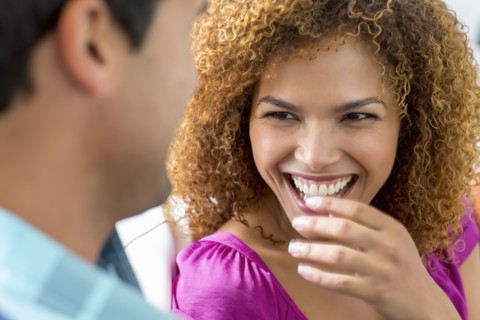 Mixed race couple talking together