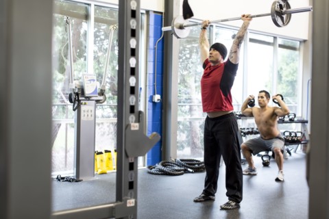 Men working out in gym