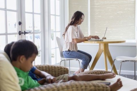 Family relaxing in living room
