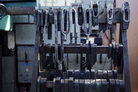 Metal parts hanging in metal shop