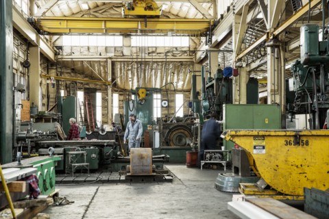 Men working in metal shop