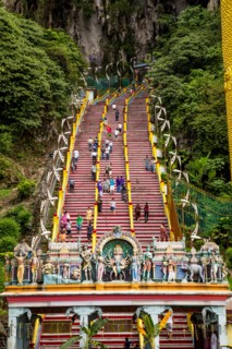 People climbing steps to Hindu shrine at Batu Caves