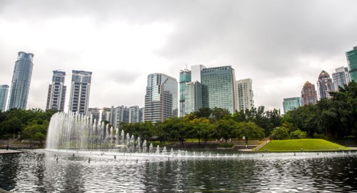 Fountain in lake in urban park
