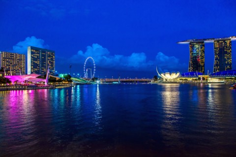 Singapore city skyline lit up at night