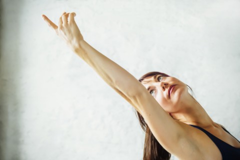 Caucasian woman practicing yoga