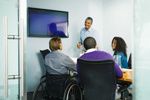 Business people talking in office meeting