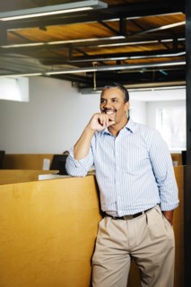 Black businessman smiling in office