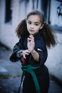 Mixed race girl practicing martial arts