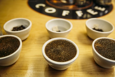 Close up of fresh ground coffee in tasting cups