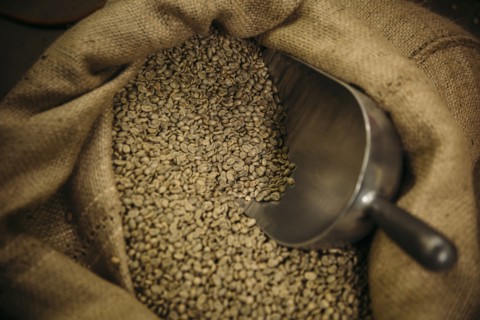 Close up of sack of raw coffee beans