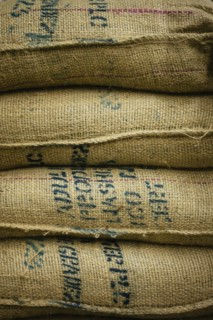 Close up of stack of burlap sacks