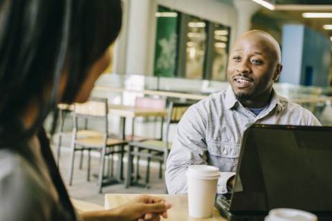 Business people working together in cafe