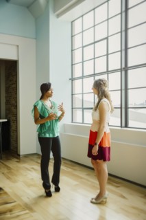 Businesswomen talking in office