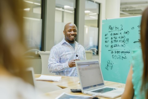Businessman talking in office meeting