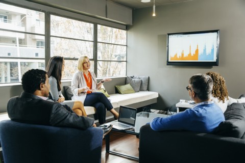 Business people having meeting in office lounge