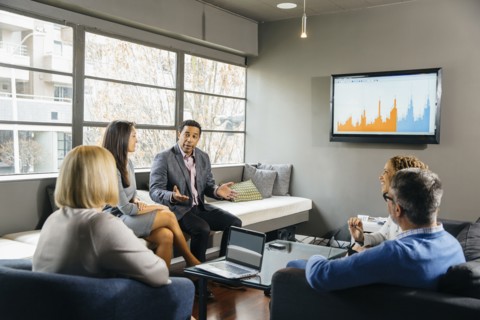 Business people having meeting in office lounge