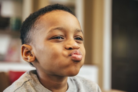 Close up of Black boy making a face