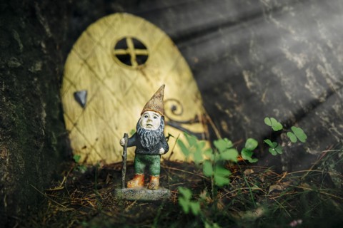 Close up of gnome figurine in garden