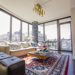Sofa and rug in urban apartment living room