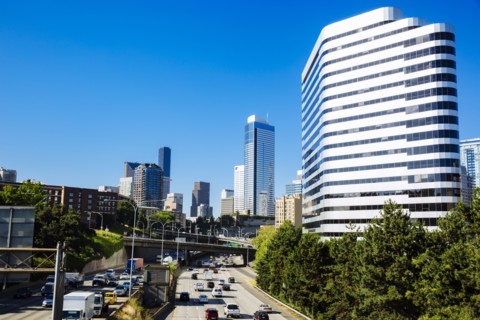 Highway traffic in Seattle cityscape