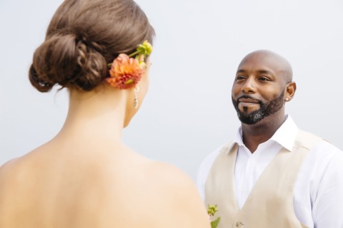 Bride and groom standing outdoors