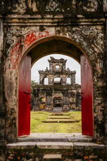 Ornate archway in dilapidated ruins