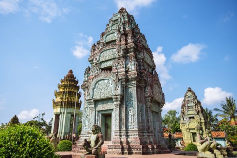 Statues and ornate pillars at Angkor Wat